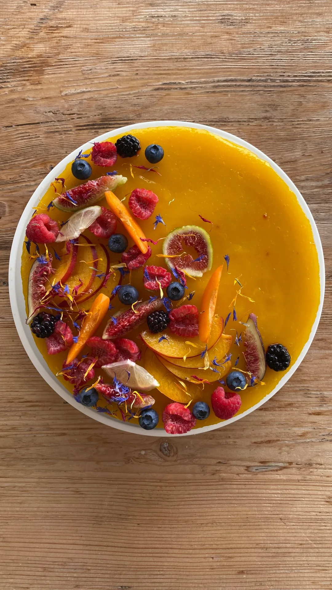 Cheesecake con coulis di mango